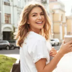 Woman holding coffee