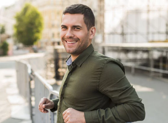 Man leaning against railing
